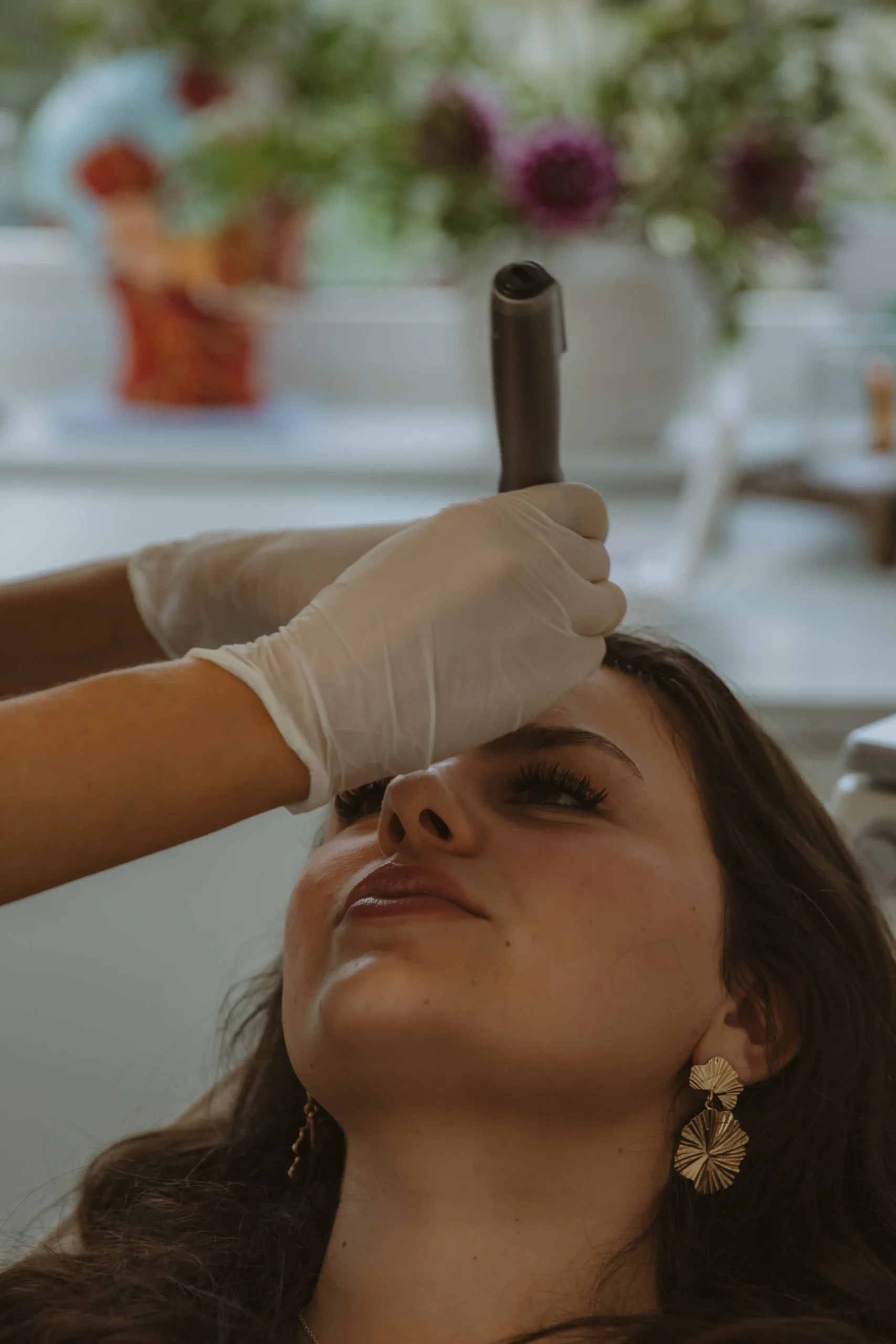 Jasmine carrying out a professional skin renewal treatment